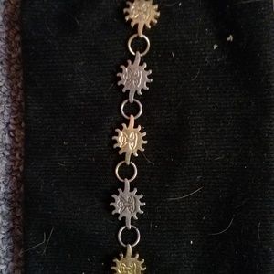 Small Silver and gold colored sun bracelet